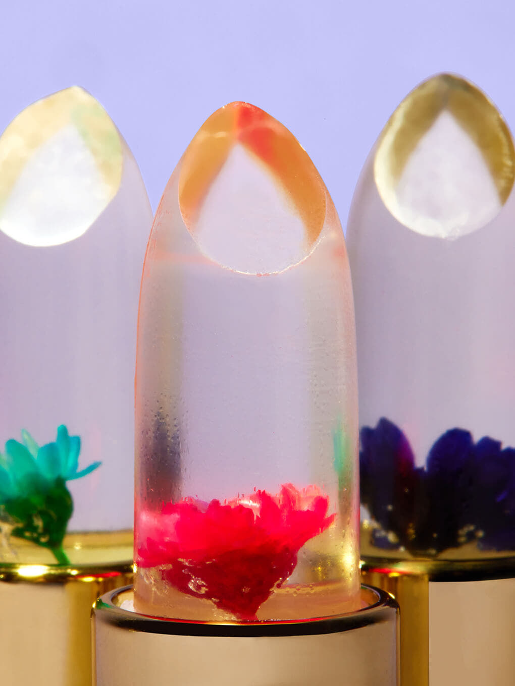 close up of the tips and flowers in the flower pH lip balm trio